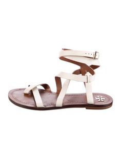 Tory Burch Leather Gladiator SandalsWhiteWrap-Around StrapsDesigner Fit: This designer typically runs true to size.Unfortunately, due to restrictions, this item may not be eligible for shipping in all areas. Leather Gladiator Sandals, Gladiator Sandals, Women's Shoes Sandals, Tory Burch, Shoes Sandals, Women Shoes, Running, Sandals, Leather