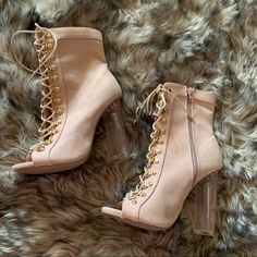 Blush Pink Open Toe Booties With Clear Heels And Gold Hardware. Never Worn. Small Spot Pictured. Size 6.5 Can Fit Size 7. Feminine Pink Lace-up Heels, Pink Lace-up Heels For Spring, Pink Lace-up Heels For Night Out, Pink Booties, Miss Lola, Clear Heels, Gold Hardware, Shoes Women Heels, Blush Pink