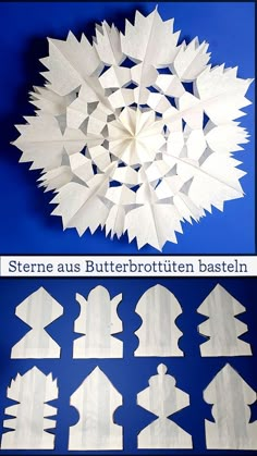 paper snowflakes are arranged in the shape of trees