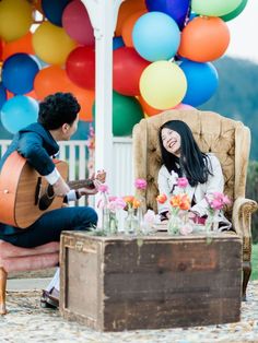 Up-inspired marriage proposal setup with colorful balloons, vintage suitcases, and adventure book, designed by The Yes Girls proposal planners for a romantic and storybook-themed experience. Disney Proposal, Disney Wedding Rings, Disney Enchanted, Surprise Wedding