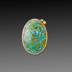 This stunning ring features vibrant blue-green turquoise, veined with the most intriguing golden inclusion patterns. Stone is wrapped in 22k gold and accented with a pair of sparkling diamonds set in 22k gold. Sterling silver back and 4mm hammered band. Stone measures approximately 1/2 inch x 3/4 inch. Matte finish. Unique Yellow Gold Oval Turquoise Ring, Gold Oval Turquoise Multi-stone Ring, Gold Turquoise Multi-stone Oval Ring, Gold Oval Multi-stone Turquoise Ring, Oval Turquoise Multi-stone Jewelry, Luxury Gold Multi-stone Turquoise Ring, Luxury Yellow Gold Turquoise Cabochon Ring, Turquoise Multi-stone 14k Gold Jewelry, Luxury Yellow Gold Turquoise Ring, Oval Cabochon