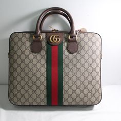 All Of My Items Are Guaranteed 100% Authentic Brand New With Tags, Dust Bag, Gucci Cards And Removable Shoulder Strap. Brand New And Never Worn Or Used Style: Briefcase Shoulder Bag Material: Gg Supreme Canvas With Brown Leather Trim Color: Beige/Ebony Style No.: 574793 Made In Italy Measurements: L 14" H 11" D 2.5" Designer Travel Briefcase With Branded Hardware, Designer Briefcase With Gold-tone Hardware, Designer Business Briefcase With Branded Hardware, Designer Briefcase With Gold-tone Hardware For Daily Use, Classic Monogram Canvas Briefcase For Formal Use, Designer Rectangular Briefcase With Gold-tone Hardware, Designer Briefcase With Branded Hardware, Designer Rectangular Briefcase With Branded Hardware, Dior Wallet On Chain