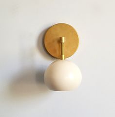 Brass and Cream single loa sconce mid century modern style Mid Century Wall Light, Eclectic Transitional, Bathroom Wall Lamp, Decorating Table, Mid Century Modern Bathroom, Lighting Bathroom, Sconces Living Room, Sazerac, Sconces Bedroom