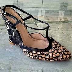 Miu Miu Limited Edition Rare Black And Brown Leather Snakeskin Round Toe Wedge Made In Italy Size: Eu38.5 Brand New No Tags. Comes With Box And Dust-Bags Selling For $750 Or Reasonable Offer. Pointed Toe Leather Wedge Sandals For Party, Miu Miu Leather Platform Heels, Miu Miu Black Heels With Heel Strap, Black Wedge Sandals With Contrasting Heel Counter, Leather Wedge Sandals With Pointed Toe, Black Luxury Wedge Sandals With Round Toe, Black Round Toe Wedge Sandals Luxury Style, Luxury Black Wedge Sandals With Round Toe, Luxury Black Round Toe Wedge Sandals