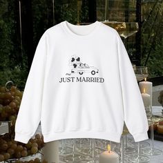 Celebrate your love in style with our cozy "JUST MARRIED" Crewneck Sweatshirt! Perfect for newlyweds, this sweatshirt combines comfort and charm, making it an ideal addition to your post-wedding wardrobe or a fun outfit for your wedding reception. Also great for matching with your husband/wife on the honeymoon! Key Features: -Made with a medium-heavy fabric blend of 50% cotton and 50% polyester -The classic fit along with the crew neckline deliver a comfy wearing experience with a clean-cut style. Meanwhile, the double-needle stitching at the shoulder, armhole, neck, waistband, and cuff seams add top-tier durability.  -Say goodbye to itchiness thanks to the gray, pearlized tear-away label.  -Made using 100% ethically grown US cotton. Gildan is also a proud member of the US Cotton Trust Pro Wedding Wardrobe, Charm Making, Post Wedding, Clean Cut, Just Married, Husband Wife, Unisex Design, Cut And Style, Heavy Fabric