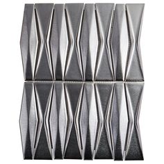 four metal squares are stacked on top of each other in the shape of pyramids