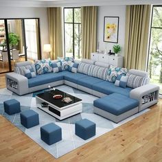 a living room with blue and white furniture