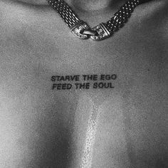 a black and white photo of a man with tattoos on his chest that says, stab the eqo feed the soul