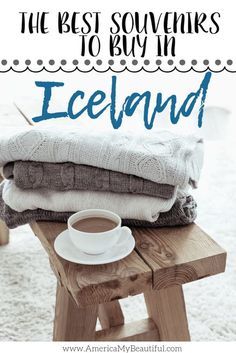 the best sources to buy an iceland blanket, sweater and cup of coffee on a wooden bench