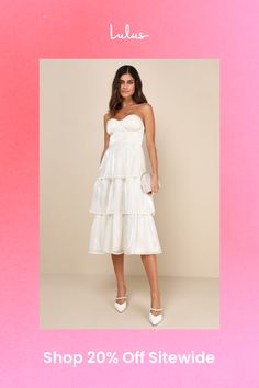 You'll have everyone wrapped around your finger in the Lulus Com-pleat-ly Charming Ivory Organza Tiered Strapless Midi Dress! Airy woven organza, with a stunning sheen throughout, shapes a pleated, strapless bustier-style bodice with hidden no-slip strips, lightly padded cups, and supportive underwire and side boning. Fitted waist tops a tiered skirt that ends at a midi hem. Hidden zipper/clasp at back. Fit: This garment fits true to size. Length: Mid-calf length. Size medium measures 40" from t Feminine Off-white Midi Dress For Party, Feminine Off White Midi Dress For Party, Summer Wedding Strapless Dress With Ruched Bodice, White Tiered Midi Dress For Wedding, Summer Wedding Strapless Dress With Pleated Bodice, White Strapless Summer Dress With Pleated Bodice, Summer Strapless Dress With Sweetheart Neckline For Wedding Guest, Cream Strapless Dress For Spring Wedding, Elegant Strapless Organza Midi Dress