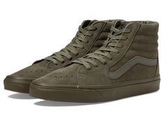 Vans SK8-Hi - Skate Shoes : Mono Suede Olive : Keep it old school every step of the way with the classic Vans SK8-Hi skateboard shoes! High-top skate shoes with a classic silhouette and Sidestrap detail. Uppers of suede, leather, or canvas. Cotton drill lining. Padded collar for added comfort and support. Triple-stitch collar adorns collar. Die-cut EVA insert. Vulcanized construction: &amp,#8226, Slimmed-down profile offers a flexible feel. &amp,#8226, Gum rubber outsole with signature waffle tr Classic Vans, Skateboard Shoes, Vans Sk8 Hi, Swag Shoes, Sk8 Hi, Vans Sk8, How To Slim Down, Skate Shoes, Product Reviews