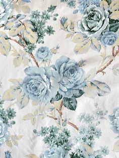 blue and yellow flowers on white fabric