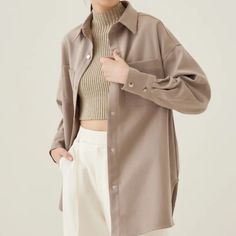 Comfort That's As Soothing As A Cup Of Green Tea. Designed To Cover You Up When Temperature Dips, We Made This In A Loose Silhouette That's Perfect If You Just Want To Throw On A Fuss-Free 'Fit And Go. Features Functional Front Patch Pockets And A High Shine Snap Closure. Oversized Collared Blouse For Winter, Oversized Collared Winter Blouse, Oversized Beige Blouse For Fall, Oversized Beige Tops With Pockets, Oversized Tops With Pockets, Oversized Beige Tops For Work, Oversized Beige Shirt For Everyday, Trendy Oversized Beige Blouse, Oversized Solid Button-up Tops