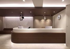 the reception area is clean and ready for customers to use in this modern office space