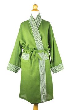 By Banlue Lueruang this handsome front-wrap robe evokes fresh forests. He works in cotton to create a long dressing gown with generous pockets. Applications of cotton cord trace mysterious labyrinth motifs that adorn the sleeves pockets and border. Luxury Green Long Sleeve Robe, Luxury Long Sleeve Green Robe, Long Gown Dress, Cushions To Make, Black Scarf, Summer Scarves, Cotton Scarf, Labyrinth, Green Cotton