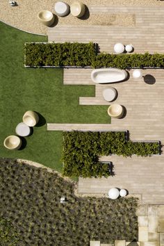 an aerial view of a patio with tables and chairs