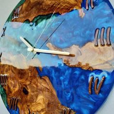 Take your home decor to a whole new level and enjoy the woodland look of an bicolor clock with these Olive Wood and Bicolor Resin Wall Clocks. Handmade out of olive wood and resin, these wooden epoxy clocks are fantastic way to remember the natural beauty that the earth provides us! If you’re looking for the best wooden clock for your wall, then this epoxy clock is the exactly what you are looking for. Epoxy resin wall clocks would make a thoughtful Christmas gift or a moving gift that will chan Epoxy Clock, Wooden Epoxy, Epoxy Resin Wall, Ocean Theme Resin Clock, Clock Resin, Geode Clock Resin, Resin Geode Wall Clock, Forest Clock, Brown Resin Clock