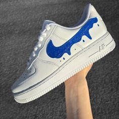 Custom Air Force 1 Blue Swoosh with Glitter * handpainted in Germany * unique and individual manufacturing * waterproof & scratch resistant * 1-2 weeks processing time INDIVIDUAL DESIGN Customizations or a completely own design? Text to me here or on Instagram (@annamarie_diy) ♥︎ Your dream shoes with: * Colors: Normal, Metallic, Neon, Glow in the Dark, Colorshifting, Sunlight sensitive * Glitter, rhinestones (e.g. Swarovski) * Engraved lace locks with name, date etc. (Lace Locks = the metal pla Casual Blue Custom Sneakers With Paint Splatter, Blue Waterproof Custom Sneakers For Sports, Custom Blue High-top Sneakers With Waterproof Paint, Blue High-top Custom Sneakers With Waterproof Paint, Blue Custom Sneakers With Waterproof Paint, Blue Sporty Custom Sneakers With Waterproof Paint, Blue Waterproof Low-top Custom Sneakers, Blue Hand-painted High-top Custom Sneakers, Hand Painted Blue Lace-up Custom Sneakers