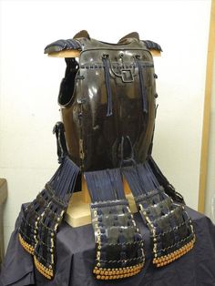 an ancient roman gladiator's helmet on display