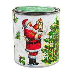 an old fashioned christmas tin with santa holding a lantern