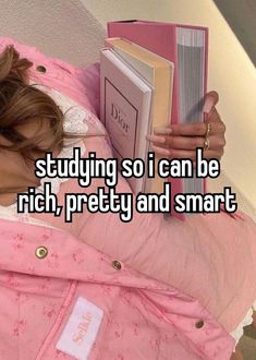 a woman laying in bed reading a book with the words studying so i can be rich, pretty and smart