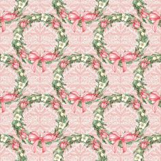 a pink and green wallpaper with bows on it's sides, surrounded by white flowers