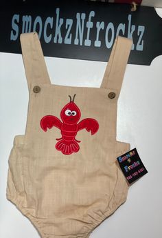 Smockznfrockz crawfish appliqué Cotton Unisex Romper Appliqué choose your appliqué @ snf Sizes 6,12,18,2,3 Item shipped daily, all sizes one price. Amazing quality super fast turnaround. Casual Cotton Bubble Romper, Casual Cotton Bubble Romper Overall, Cute Red Cotton Jumpsuit And Rompers, Casual Cotton Embroidered Overalls, Casual Embroidered Cotton Overalls, Casual Red Cotton Shortalls, Crochet Crawfish, Casual Red Bubble Romper For Playtime, Playful Cotton Bubble Romper With Smocked Back