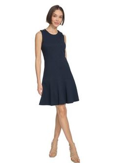 Elevate your casual style with this chic mini dress from Tommy Hilfiger. Its zip closure and round neckline offer effortless wear, while the fit-and-flare silhouette flatters all figures. Crafted from a soft and stretchy material, this dress ensures comfort and a polished look. | Tommy Hilfiger Women's Basket Knit Sleeveless Fit and Flare Dress, 16 Casual A-line Dress By Tommy Hilfiger, Chic Fitted Tommy Hilfiger Mini Dress, Chic Knee-length Tommy Hilfiger Dress, Chic Tommy Hilfiger A-line Dress, Chic A-line Tommy Hilfiger Dress, Tommy Hilfiger Knee-length Mini Dress For Work, Chic Tommy Hilfiger Mini Dress For Work, Tommy Hilfiger Sleeveless Dress For Summer, Tommy Hilfiger Summer Mini Dress