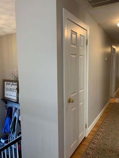 the hallway is clean and ready to be used as a storage area for shoes or other items