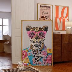 a leopard wearing pink glasses is on display in a room with wood floors and white walls