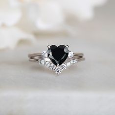 Heart cut Black Simulated Diamond Ring ♦ Handmade, high-quality item (Made to order) ♦ Material:925 Sterling silver (can be made in Solid white/rose/yellow gold) ♦Finish:  High Polishing Finish with Rhodium platting ♦ Center stone: Black Simulated Diamond (Black Cubic Zirconia) ♦ Size/Weight: Heart cut 7x7 mm  ♦ Color: Black ♦ Side stones: Simulated Diamonds(7A grade super quality cubic zirconia) ♦ Cut -, Round 2.5mmx2pcs ♦ Color: D ♦Clarity: VVS1 ♦Cut Grade: Excellent ♦ Width of band bottom - 1 Black Stone Engagement Ring Zales, Black Promise Rings For Him And Her, Simple Goth Engagement Rings, Black Julery, Black Heart Engagement Ring, Black And White Wedding Ring, Black Engagement Ring Simple, Black Diamond Engagement Ring Silver, Rings Engagement Black