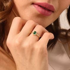 14k Gold Emerald Engagement Ring, Elevate your romance with our 14k Gold Emerald Engagement Ring, a solid gold halo solitaire that captures the essence of timeless elegance. This ring features an exquisite emerald-cut green gemstone, creating a striking visual impact. The minimal vintage design adds a touch of sophistication, making it an ideal choice for an anniversary celebration or a special token of love. Meticulously crafted to showcase the radiant beauty of the emerald, this ring is a test Yellow Gold Halo Emerald Promise Ring, 14k Gold Halo Jewelry For May Birthstone, 14k Gold Birthstone Ring With Emerald Cut Halo Setting, 14k Gold Ring With Halo Setting For May Birthstone, 14k Gold Halo Ring For May Birthstone, Gift 14k Gold Emerald Ring With Halo Setting, Yellow Gold Emerald Halo Ring For Promise, Emerald Cut Halo Ring For May Birthstone, Emerald Ring With Prong Setting In 14k Gold