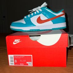 Miami Dolphin Nike Dunks Orange Low-top Skate Shoes With Contrast Sole, Nike Orange Sneakers With Contrast Sole, Nike Orange Skate Shoes With Gum Sole, Nike Orange Skate Shoes With Rubber Sole, Low-top Orange Basketball Shoes With Contrast Sole, Nike Custom Orange Sneakers With Contrast Sole, Orange Skate Shoes With Cushioned Footbed And Round Toe, Jordan 5 Aqua, Miami Dolphins Shoes