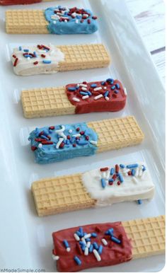 red, white and blue waffles are arranged in rows on a platter