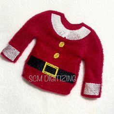 a red sweater with a santa clause on the chest and white trimming around it