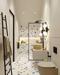 a bathroom with a toilet, sink and ladder in the floor next to wallpaper