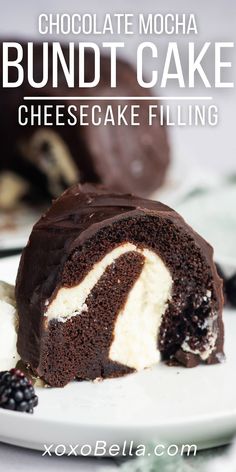 chocolate mocha bundt cake cheesecake filling on a white plate with blackberries