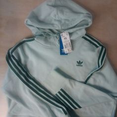 Nwt Adidas 3 Stripe Cropped Hoodie Sweatshirt Vapour Green - Size X-Small, Measures P2p=25" Length=16" Sleeve Length=22" Adidas Cotton Sweatshirt With Drawstring Hood, Adidas Cotton Hoodie With Ribbed Cuffs, Adidas Cotton Sweatshirt In Athleisure Style, Adidas Cotton Athleisure Sweatshirt, Sporty Cotton Adidas Sweatshirt, Adidas Cotton Hoodie With Drawstring Hood, Adidas Green Sportswear Top, Adidas Sporty Sweatshirt With Double-lined Hood, Spring Sportswear Hoodie With Ribbed Cuffs