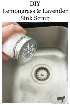 a hand is holding a bottle over a sink with the words diy lemongrass and lavender sink scrub