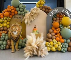 a lion themed birthday party with balloons and decorations