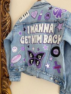 a denim jacket with patches on it that says i wanna't get him back