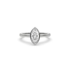 Marquise Diamond Bezel Engagement Ring is made with a marquise cut diamond set in a bezel setting on a solid gold band. Details: - Made to Order- Diamond Weight: 0.25 CT, 0.50 CT, 0.75 CT, 1.00 CT- No. Of Diamonds: 1- Diamond Cut: Marquise- Diamond Type: Lab Grown Diamond (CVD, HPHT)- Diamond Clarity: VS - Diamond Color: Colorless (DEF)- Setting Type: Bezel - Metal Type: 14K Solid Gold,18K Solid Gold- Choice of Gold Color: Yellow Gold, White Gold, Rose Gold - Jewelry Certification: Jewelry price Marquise Diamond Ring With Bezel Setting, Modern Marquise Cut Diamond Ring With Bezel Setting, Modern Marquise-cut Diamond Ring With Bezel Setting, 14k White Gold Marquise Rings, 14k White Gold Marquise Diamond Ring, Classic Marquise Cut Ring With Bezel Setting, Elegant Marquise Cut Ring With Bezel Setting, Fine Jewelry Marquise Cut Ring With Bezel Setting, Formal Marquise Diamond Ring With Bezel Setting