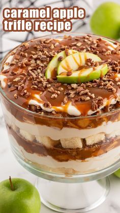 an apple dessert in a glass dish with caramel and pecans on the side