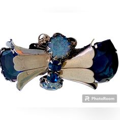 Blue Victorian Brooch For Formal Occasions, Blue Victorian Brooches For Formal Occasions, Victorian Blue Brooch For Formal Occasions, Elegant Blue Jeweled Brooches, Unique Blue Brooches For Formal Occasions, Formal Silver Jeweled Brooches, Silver Jeweled Brooches For Formal Occasions, Silver Jeweled Brooches For Evening, Unique Blue Brooch For Party