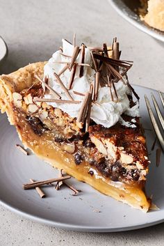 a slice of pie with whipped cream on top