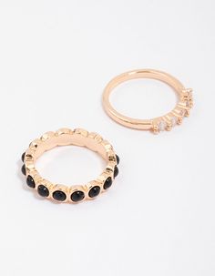 Embellish your look with these simple stacking rings! This dainty duo includes two gorgeous, gold-toned bands adorned with black and crystal diamantes for a two-toned inspired look. Layer them stacked ontop of each other for a curated finish. Material: Crystal Dimensions: Diameter 18.5mm x Band Width 4mm | Lovisa Gold Rounded Band Stacking Rings, Size: Medium/Large, Black Elegant Black Metal Midi Rings, Simple Stacking Rings, Favorite Rings, Stacking Rings, Ring Necklace, Two Tone, Band Rings, Ring Size, Band