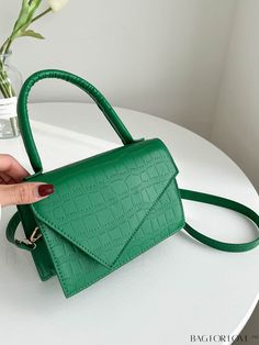 BagForLove - Crocodile Embossed Mini Flap Square Bag Product Description Color Green Type Square Bag Bag Size Mini Strap Type Top Handle Composition 100% Polyurethane Material PU Leather Size Chart INCH CM Strap Length Bag Length Bag Width Bag Height Handle Height 43.3 inch 7.5 inch 2.8 inch 5.1 inch 4.7 inch Strap Length Bag Length Bag Width Bag Height Handle Height 110 cm 19 cm 7 cm 13 cm 12 cm Details Pictures Similar Products h2 { text-align: center; } /* æ¢è¡ */ li{ white-space: normal; w Green Crocodile Pattern Satchel With Double Handle, Green Crocodile Pattern Satchel For Daily Use, Green Crocodile Pattern Shoulder Bag, Green Top Handle Bag With Single Handle, Green Crocodile Pattern Shoulder Satchel, Trendy Green Crocodile Pattern Bag, Green Crocodile Pattern Handheld Bag, Green Crocodile Pattern Tote Bag, Green Double Handle Faux Leather Bag