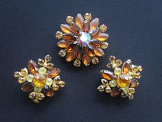 "Mesmerizing Vintage From Designer JUDY LEE Jewelry Navette or Marquise Round Cut Amber Citrine Colored Rhinestone With Frosted Glass and Aurora Borealis Crystal Rhinestone Filigree Gold Tone Floral Design Brooch and Earrings Measures brooch 2\" across and each earring 1-7/8\" across. each piece is signed Judy-Lee. Each piece is in very good vintage condition with minor signs of wear due to its age. Overall they're beautiful clean and ready to wear!. For more beautiful and fabulous of vintage je Yellow Brooch Jewelry For Wedding, Yellow Wedding Jewelry Brooch, Orange Citrine, Antique Pins, Aurora Borealis Crystal, Stone Bangle, Gold Chain Jewelry, Vintage Costume Jewelry, Chain Link Necklace