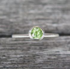 "Made in Germany: A stacking ring, consisting of 925 silver, framed green peridot, can be combined with other rings, loosely portable to each other. The focus is on the beautiful gemstones. The silver ring is made of solid 925/- sterling silver, weighs about 2g silver depending on the size. Ring size 55, ready to ship, other sizes 1-2 business days longer production time. All sizes available. The rings lie together individually and can also be purchased individually. Combination possibilities wi Shiny Rings, Green Peridot, Stackable Rings, Stacking Rings, Gemstone Colors, Solid 925 Sterling Silver, Heart Ring, Or Rose, 925 Silver