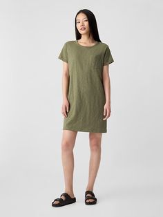 Pocket T-Shirt Dress | Gap Factory Green Cotton Casual T-shirt Dress, Casual Crew Neck Dress With Pockets, Casual Relaxed Fit T-shirt Dress For Loungewear, Casual T-shirt Dress For Summer Workwear, Casual Loungewear Dress With Curved Hem, Relaxed Fit Crew Neck Everyday Dress, Spring Crew Neck Dress With Side Pockets, Casual Crew Neck Dress With Side Pockets, Summer Crew Neck Dresses With Side Pockets